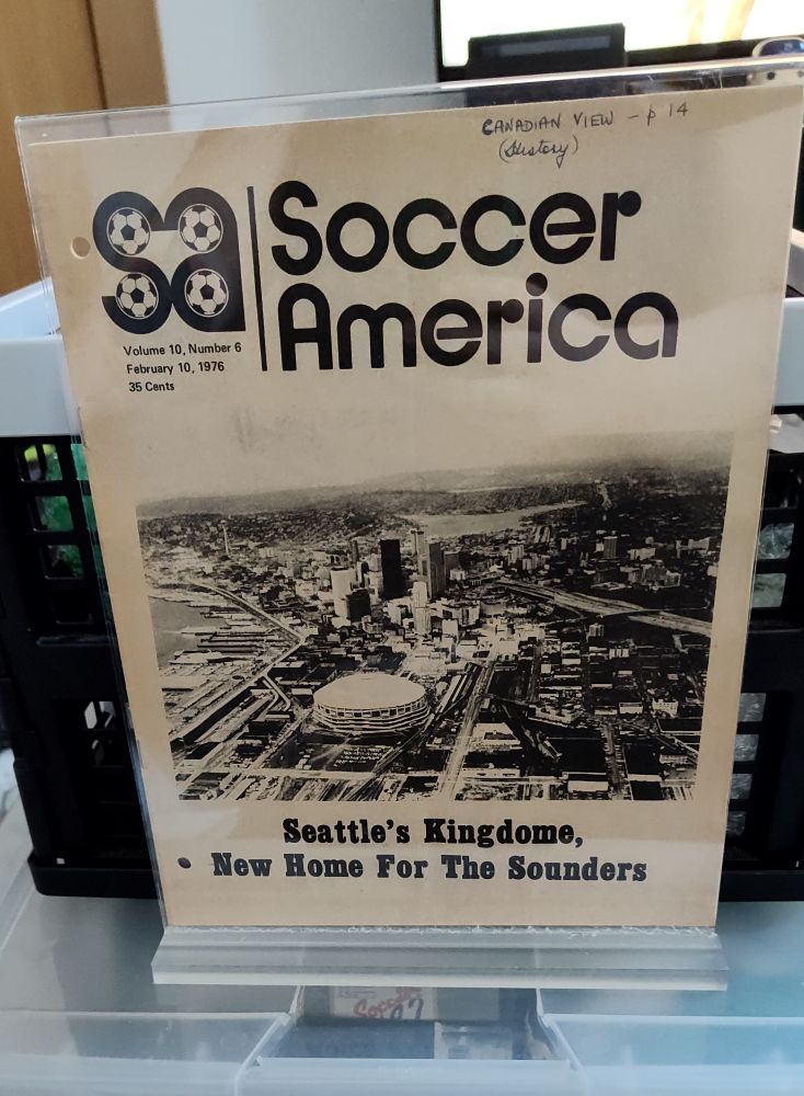 A copy of soccer America from February 10, 1976
"Seattle's Kingdome, New Home For The Sounders"
Black and white photo of the Kingdome and downtown Seattle 