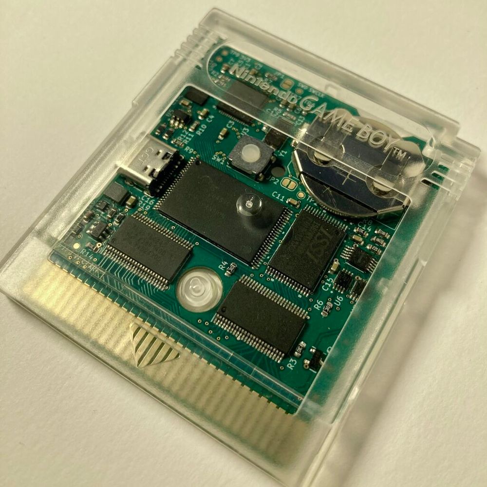 photo of rp 2040 flash cart for game boy clear shell  chips on pcb
