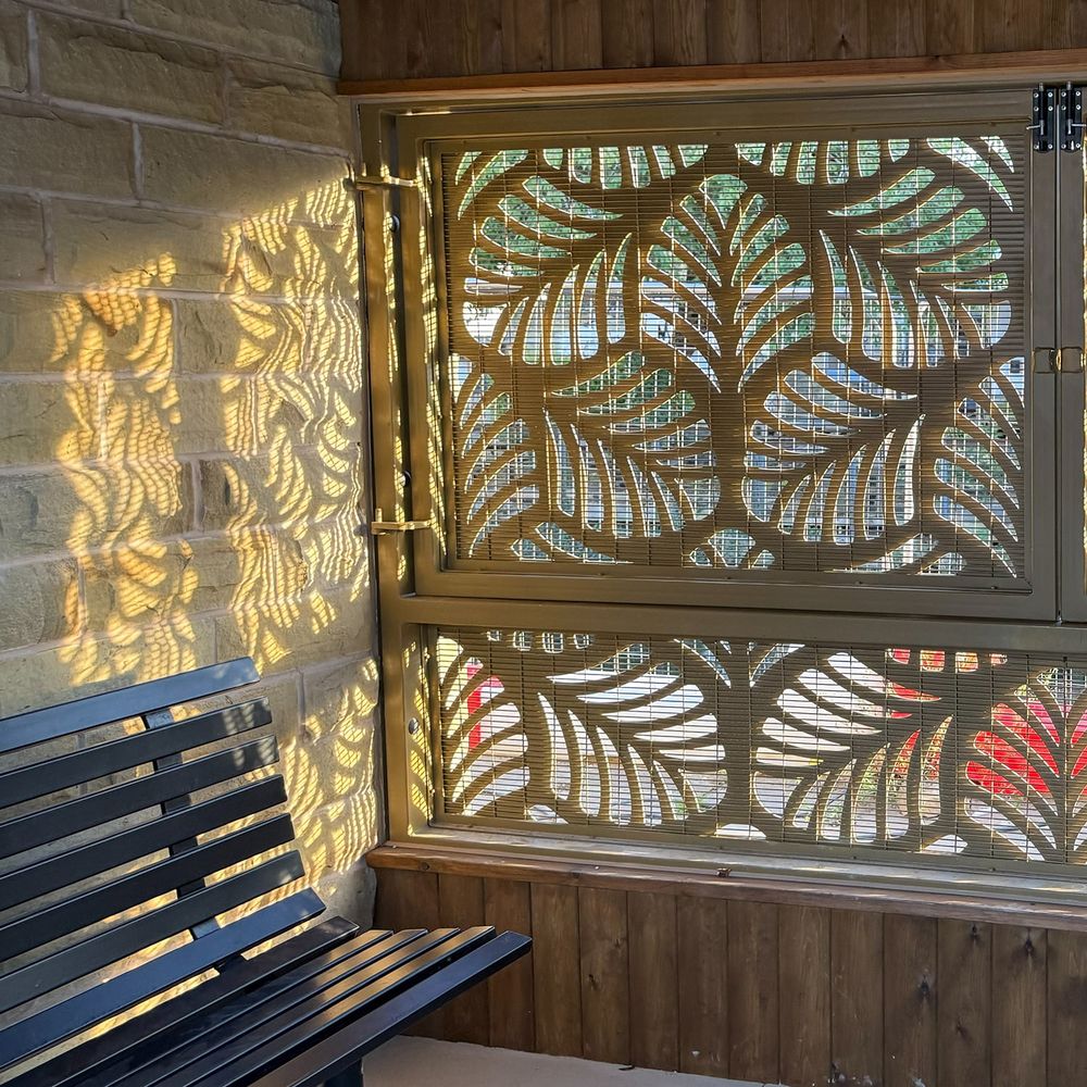 Suns streams through decorative panels into the new Brighouse market.