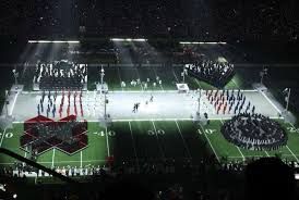 kendrick lamar super bowl halftime performance still shot of the dancers arranged in a playstation controller form