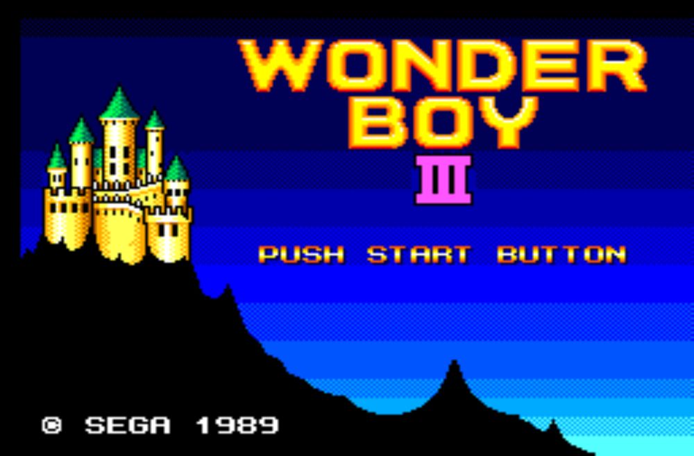 The title screen for Wonder Boy III on the Sega Master System. The game's title is shown in a dark blue sky. There is a yellow castle with green roofs shown on the silhouette of a craggy mountain.  