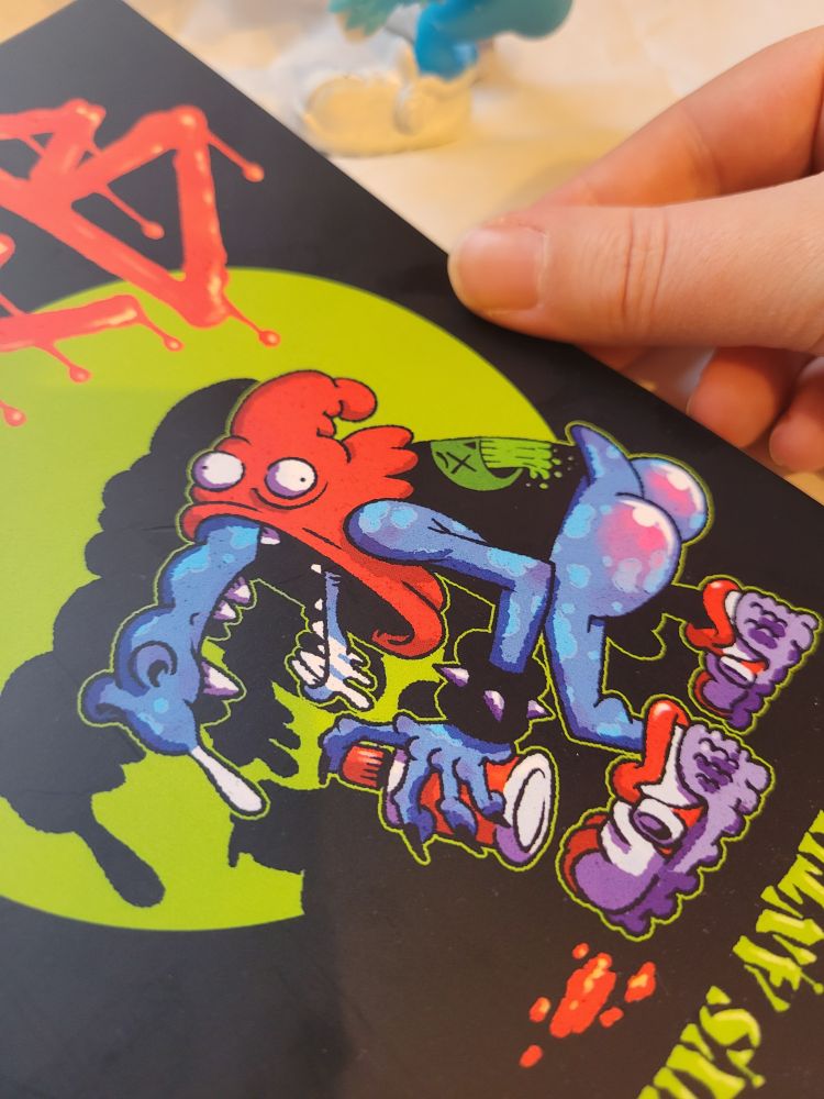 close up on the greb from the book cover. his arse is so shiny.