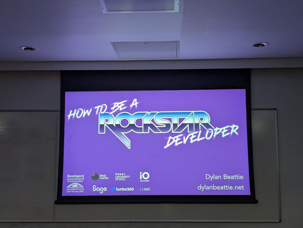Presentation title at DDD North, Hull, UK: How to be a rockstar developer, about the Rockstar language by Dylan Beattie.
