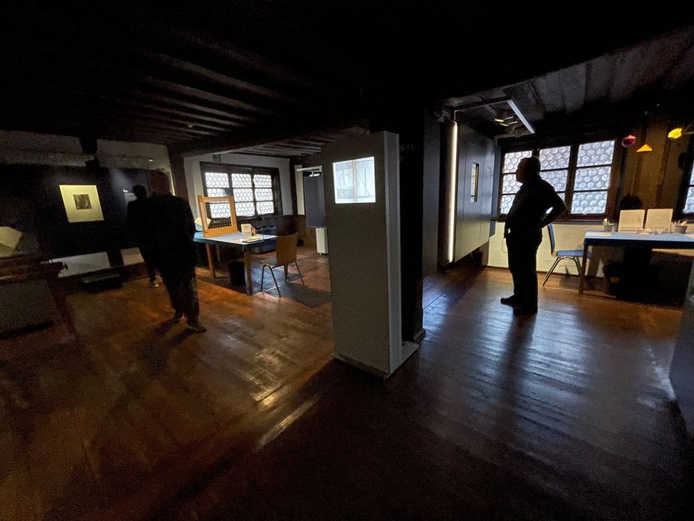 The exhibition room in Dürer's house, with on the mid left center Dürer's Melencolia I