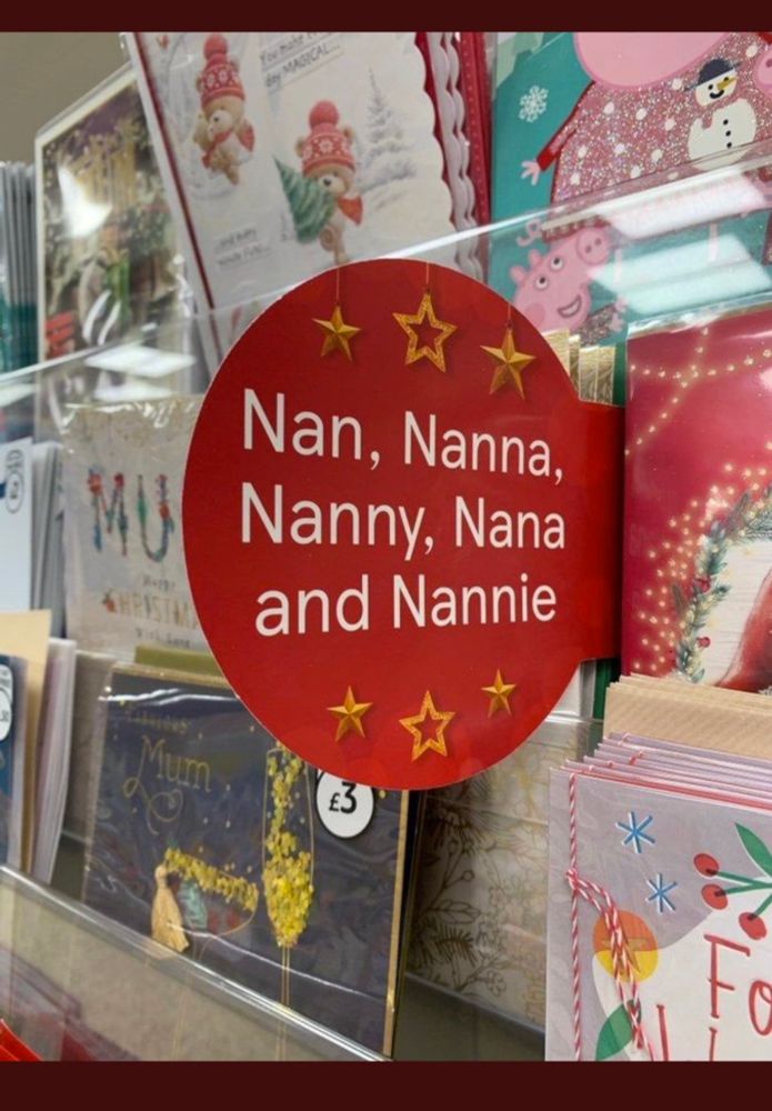 sign for a gift card section with different variations of the word nana