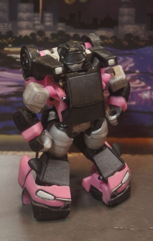 Pullback, my Transformers OC figure, standing in a hands-on-hips position.