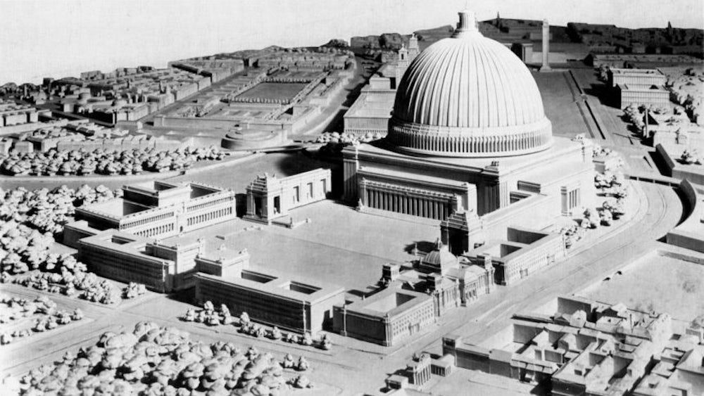 A picture of Albert Speer's design for Hitler's "Hall of the People" next to the (comparatively small) Reichstag building.