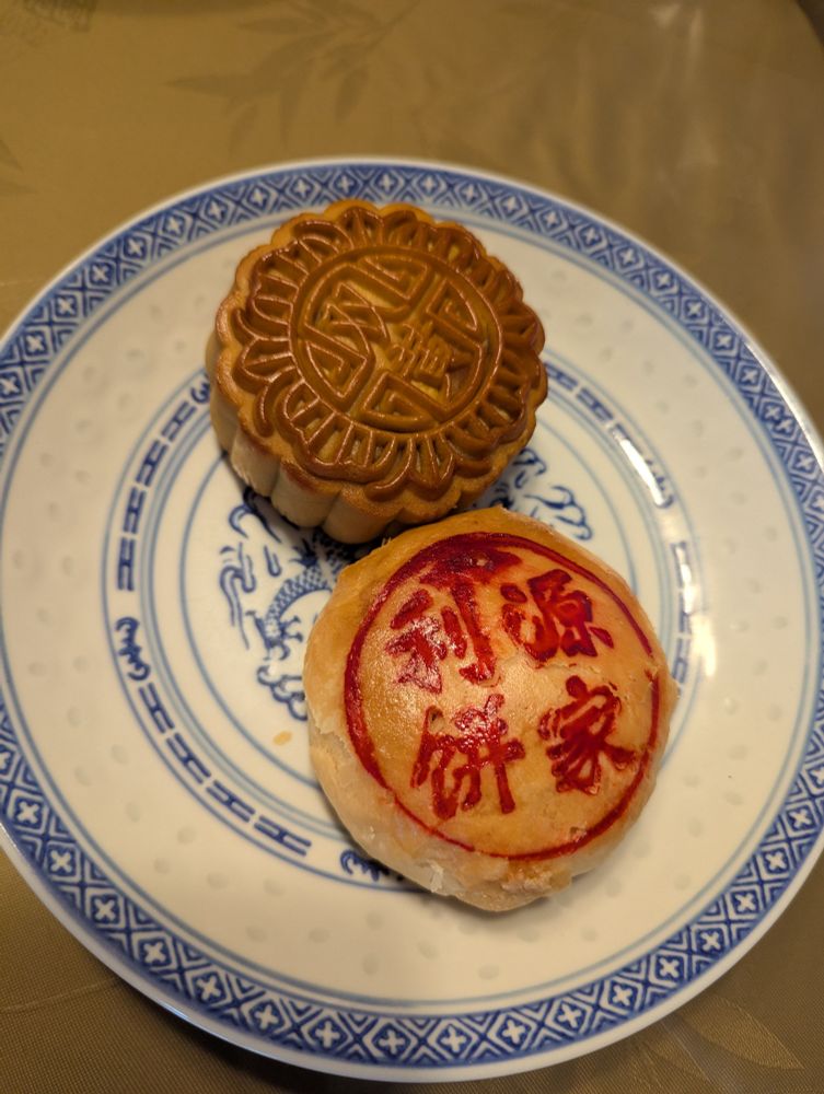 A plate with Cantonese and Teochew mooncakes.
