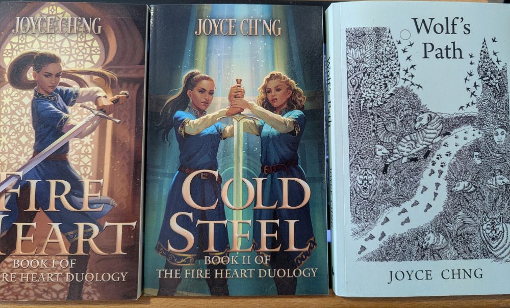 Copies of Fire Heart, Cold Steel and Wolf's Path. 