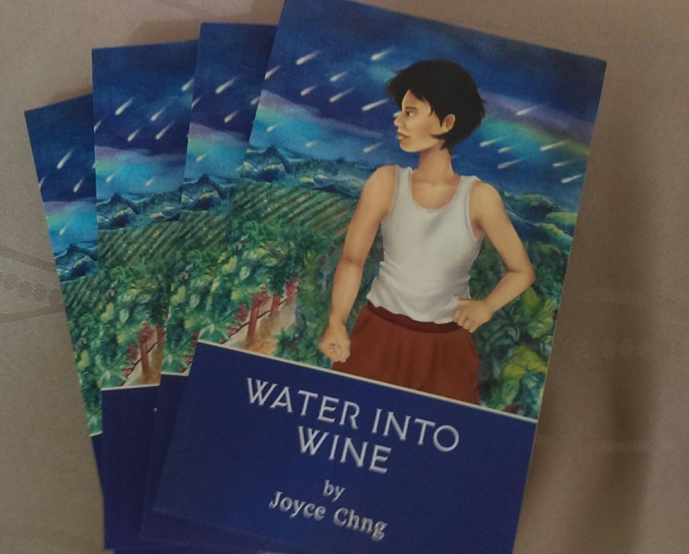 Copies of Water Into Wine, cover illustrator is Dhiyanah Hassan.