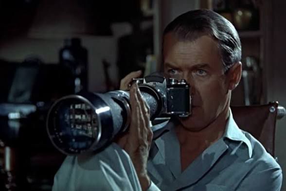 The creepiest of neighbors, this peeping tom weirdo.  A still of Jimmy Stewart in Rear Window.