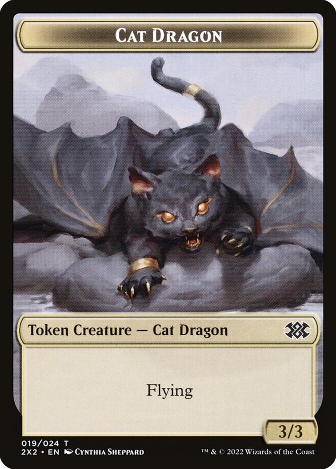 A picture of the Cat Dragon token from Magic the Gathering. They are a three power, three toughness kitten with large dragon wings and the flying keyword.