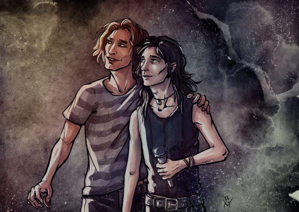 Two musicians, Jay and Val, on stage. Jay has his arm around Val who is holding a microphone.