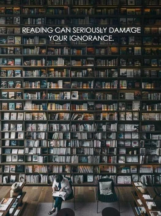 A person sitting in front of a wall of books.  The caption reads, "reading can seriously damage your ignorance."