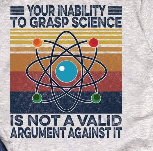 A model of an atom.  The caption reads, "Your inability to grasp science is not a valid argument against it."