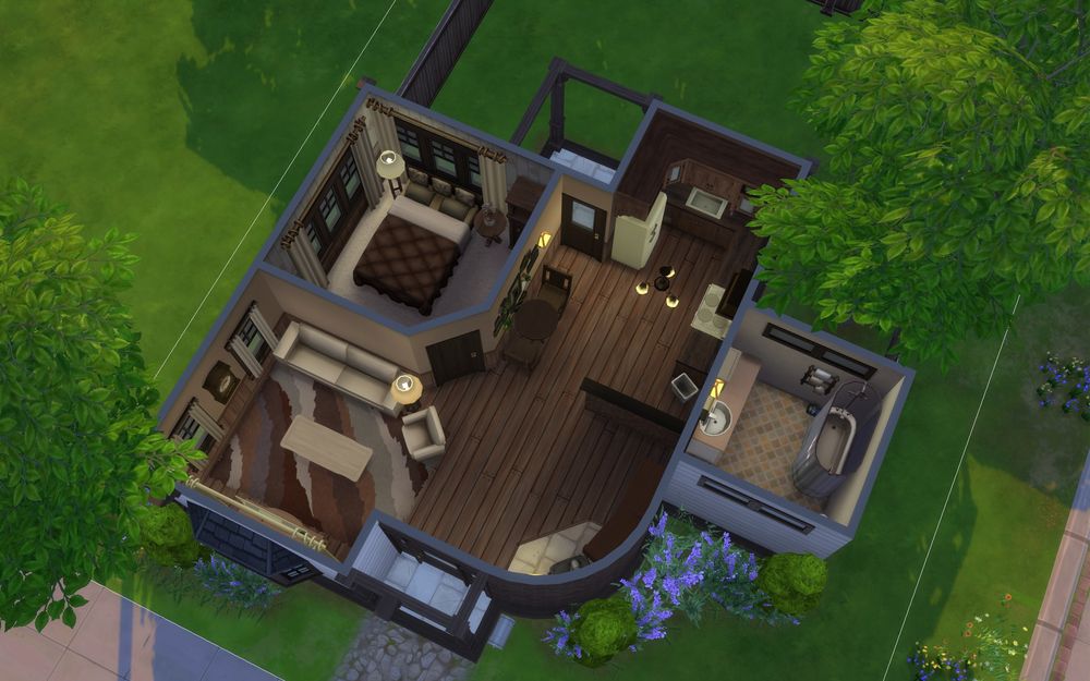 Overview of the house layout. One bedroom, one bathroom, and an open den/kitchen. 