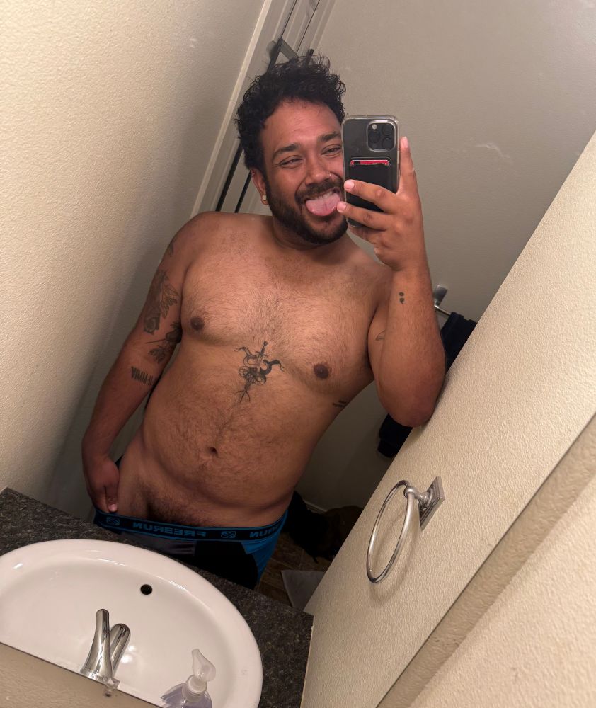 Another bathroom selfie but he is sticking his tongue in this pic 