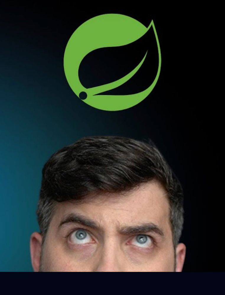 A man just out a frame looking up with an eyebrow raised. Above him is a circle with a leaf outlined in it.