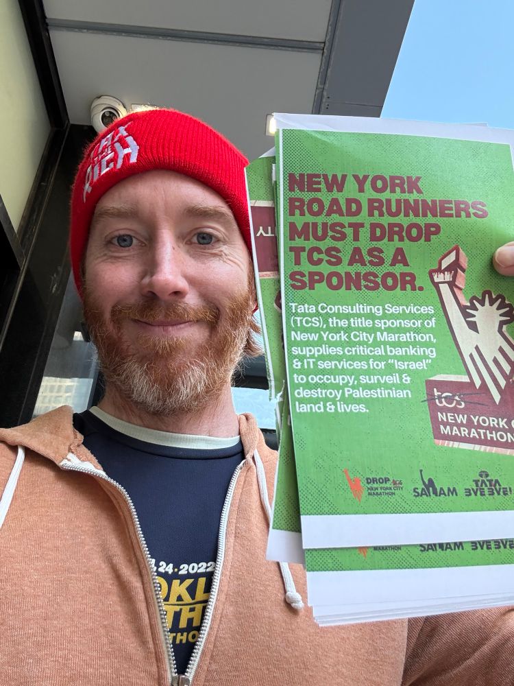marathon cheering section in Long Island City flyering the people 