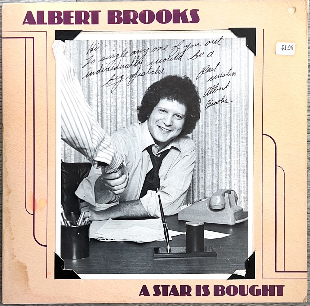 A cover of the album “A star is bought” by Albert Brooks
