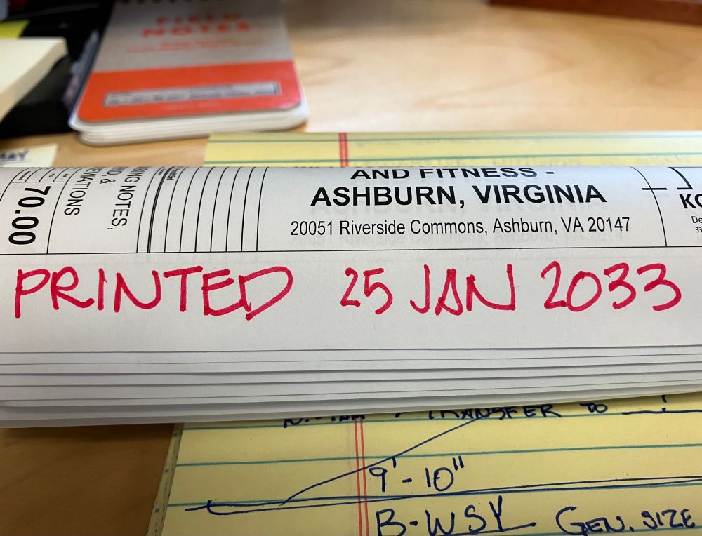 Roll of architectural plan drawings inscribed “Printed 25 Jan 2033”