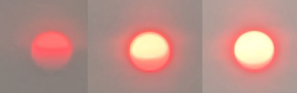 Three images of sun as it seems to emerge from a red-pink wrapper.