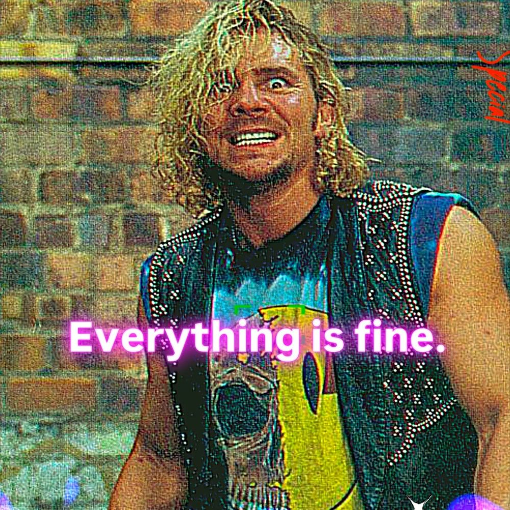 Brian Pillman looking frazzled and panicked with chaotic blonde hair and a pink/white text that says "Everything is fine." 