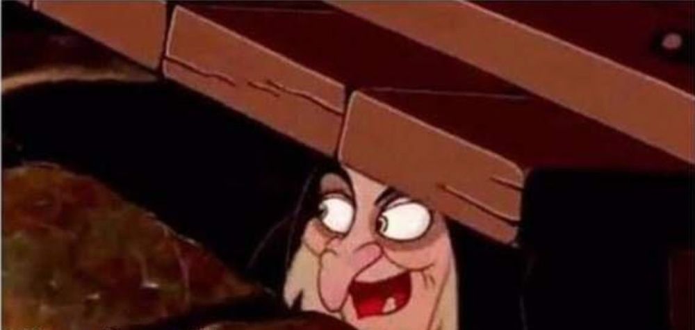 disney witch peaking out from under the trapdoor in the floor meme image