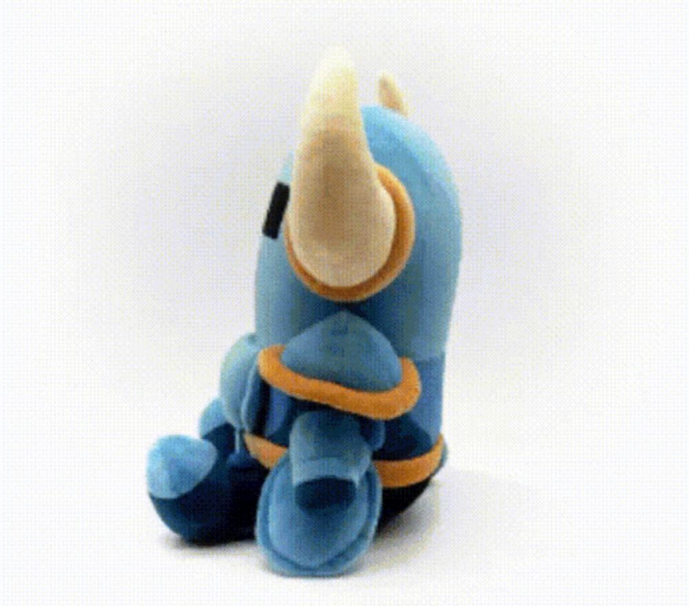 the back of a stuffed animal with horns and armor is shown .