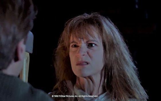 Rose from SO I MARRIED AN AXE MURDERER wielding a small axe and making a sinister face