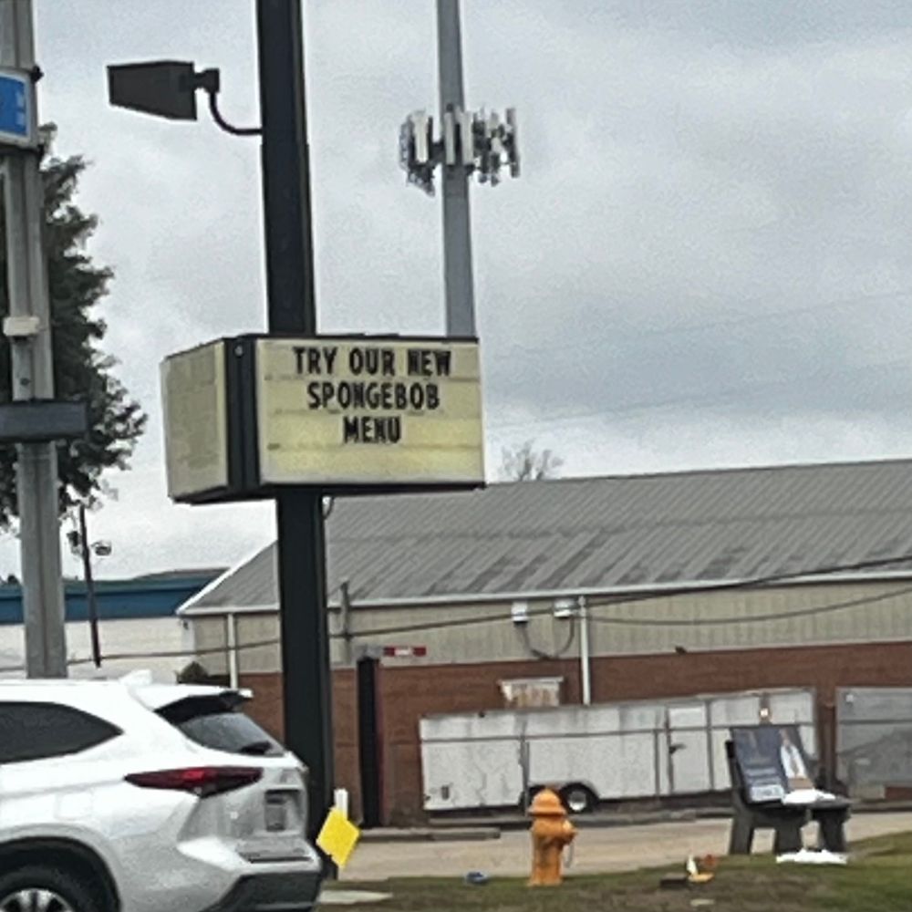 Restaurant marquee that says “Try our new Spongebob menu”