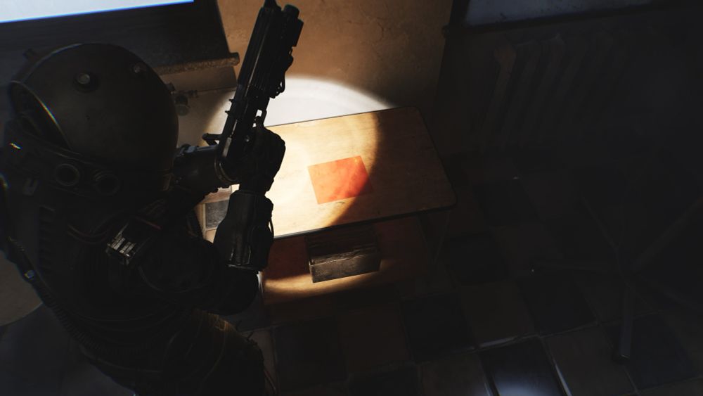 The Traveler from CRONOS: THE NEW DAWN looking down at a red square on a table