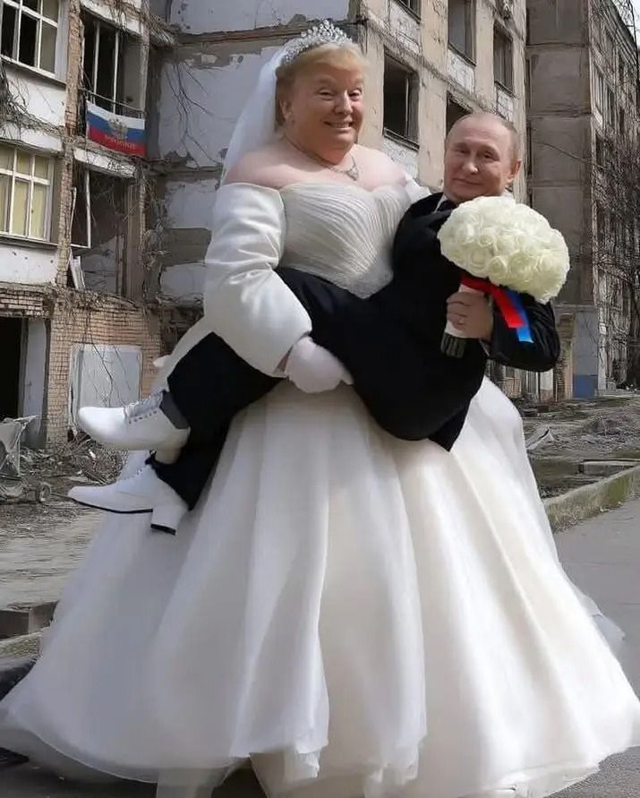 Altered photo showing Trump in wedding gown carrying Putin in a tux. 