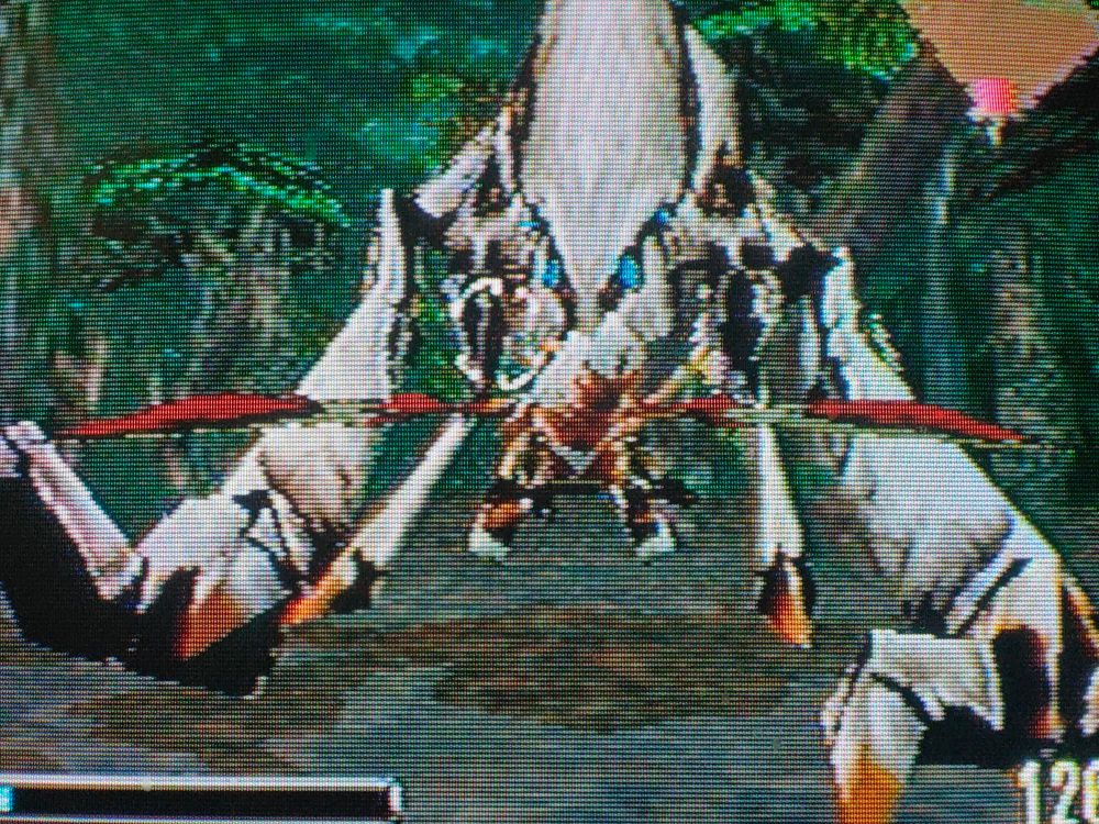 A dragon encountering a large monster in the forest in Panzer Dragoon Zwei 