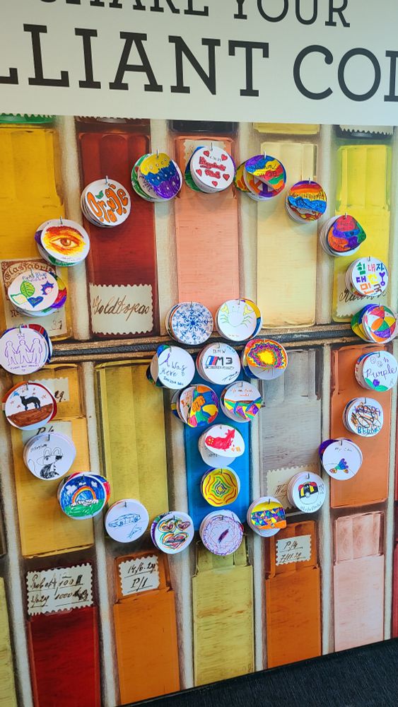 A multitude of marker drawings made by many different visitors. Who knows how many more circles will be added on!