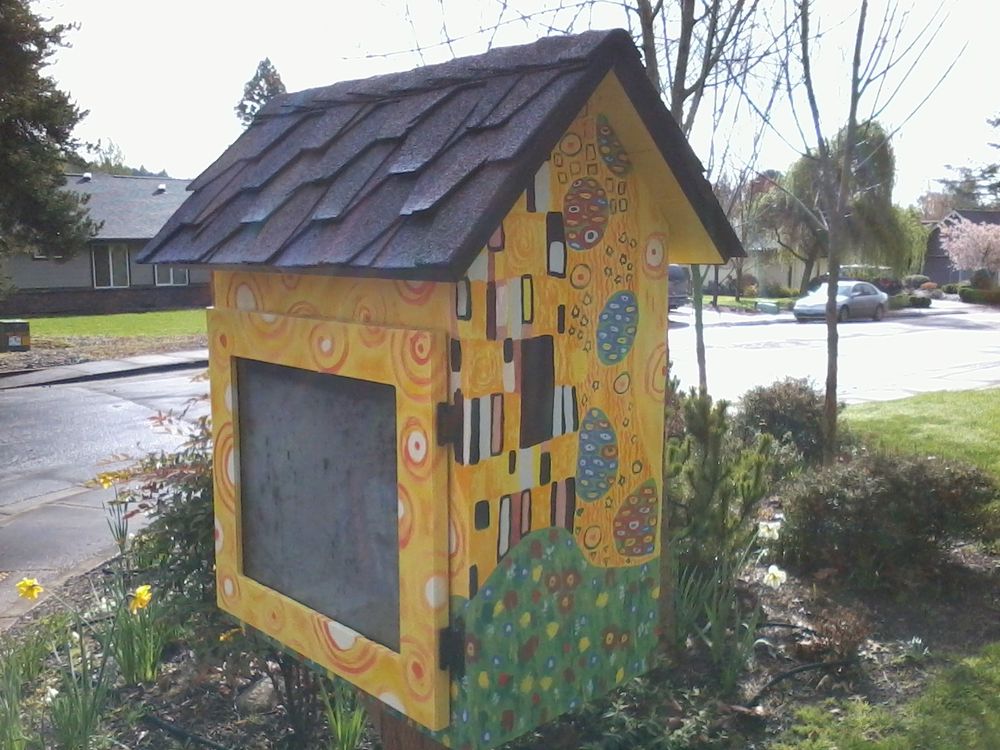 A curbside little library styled after Klimt's "The Kiss" 
3025 NW Manzanita Place, Corvallis, OR, USA