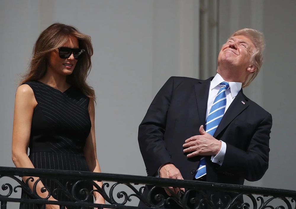 Donald Trump looking directly at the sun without eye protection during non-total phase of 2017 solar eclipse