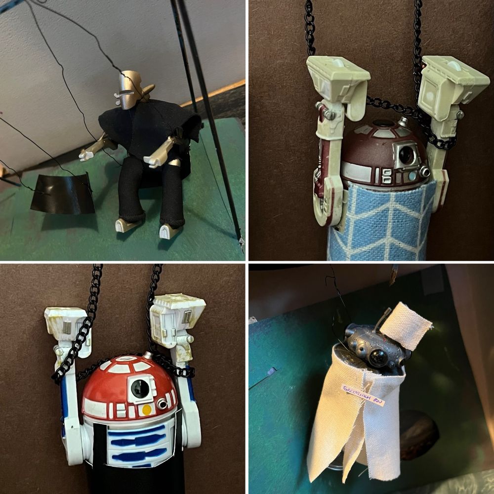 Archy as Angel on a my attempt at a swing set. 
R4-P17 as Cordelia and R3-T2 as Buffy hanging in chains again a stone wall. 
Viper as Nurse Greenliegh hanging in the sewer set. 