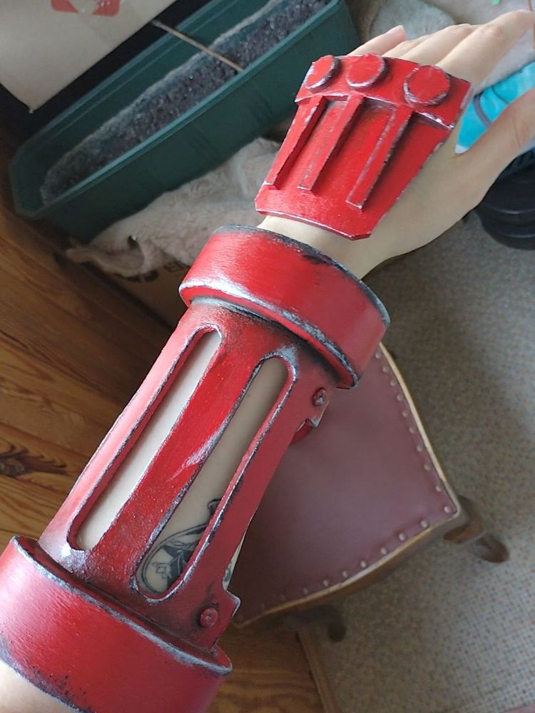 Photo of a Cammy from Street Fighter bracer cosplay commission