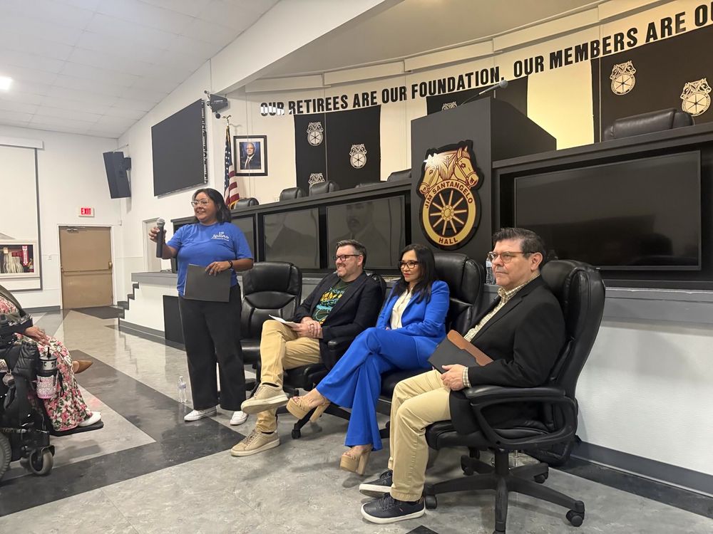Long Beach Latino Democratic Club President Kiki Lizagarra introducing our panelists, Cory Allen, Nilza Serrano and Mario Solis-Marich.
