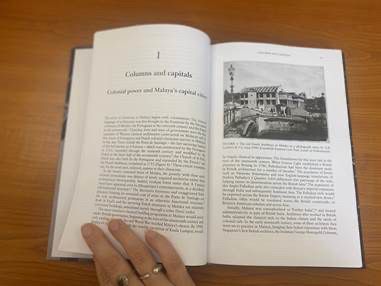 Image of a two-page spread of a book illustrated with historic black and white images.