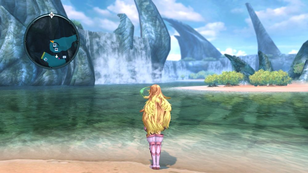 screenshot of tales of xillia remastered the scenary is of the sand and water, with waterfalls and big rocks