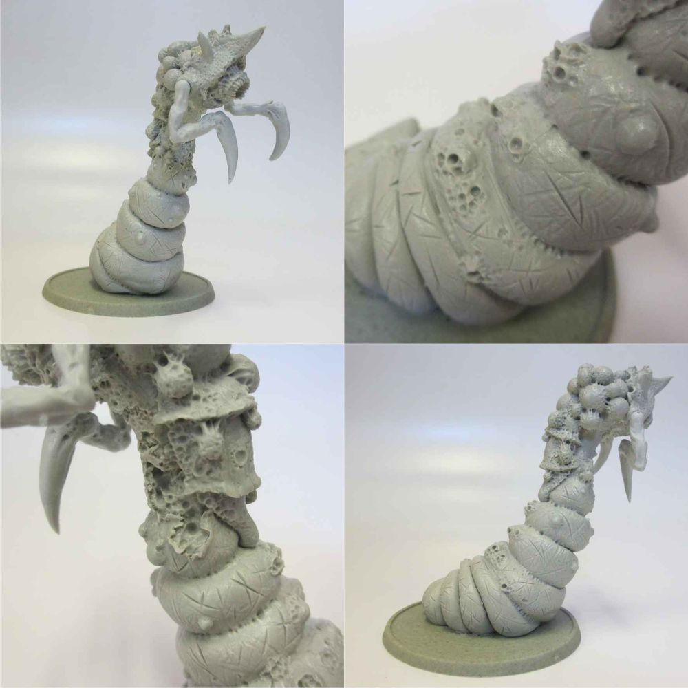 An unpainted collection of pictures from all sides of the maggotqueen miniature 