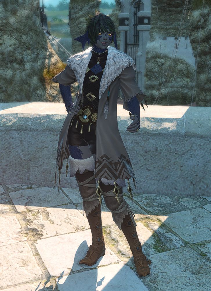A screenshot of a Final Fantasy 14 character wearing a tan, furred jacket with a strappy leather top and shorts underneath.