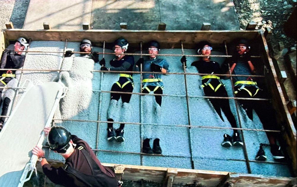 the cement pouring on people challenge from the fear factor tv spot from the world series 