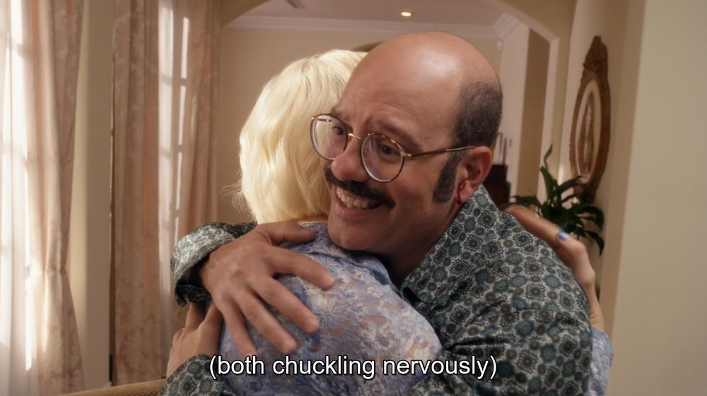 From the show Arrested Development. Tobias hugs Debrie and they "(both chuckle nervously)."
