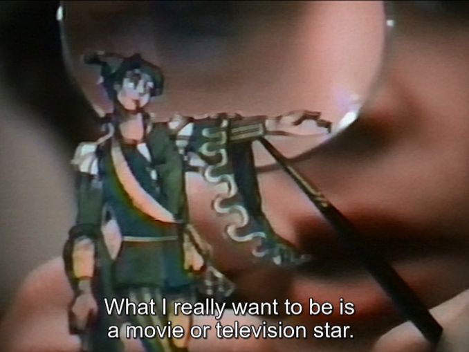 From the film "Mazes & Monsters." A tween nerd paints a miniature in closeup while saying "What I really want to be is a movie or television star."
