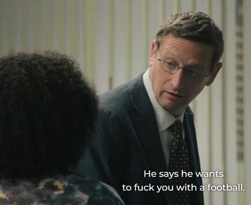 Ron looks taken aback. Ron's coworker says "He says he wants to fuck you with a football."