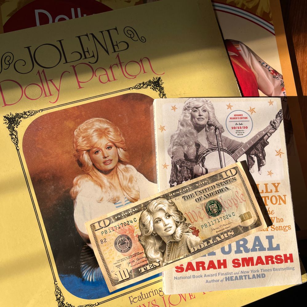 An image of a “10” - dollar bill and amazing human! The singer, song-writer Dolly Parton!!

I was introduce to the music of Dolly Parton years ago, but more recently fell absolutely in love with it and her after listening to the Radio-Lab podcast series “Dolly Parton’s America”. It’s fantastic and gave me so much more appreciation for her talent and history. 

#dollyparton #scavengerhunt #dolly #roguehunt 

@theroguehunt.bsky.social 
