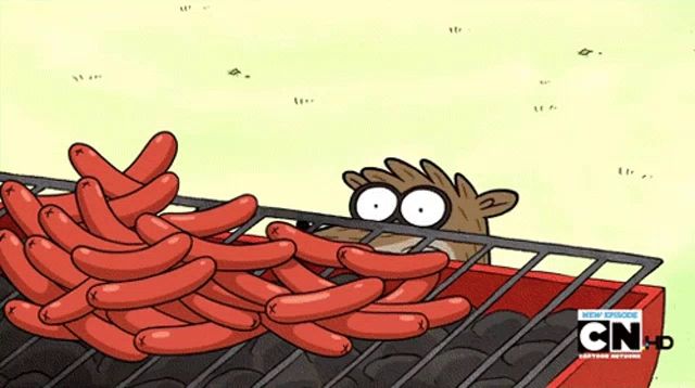 a cartoon character is peeking over a bunch of hot dogs from cn